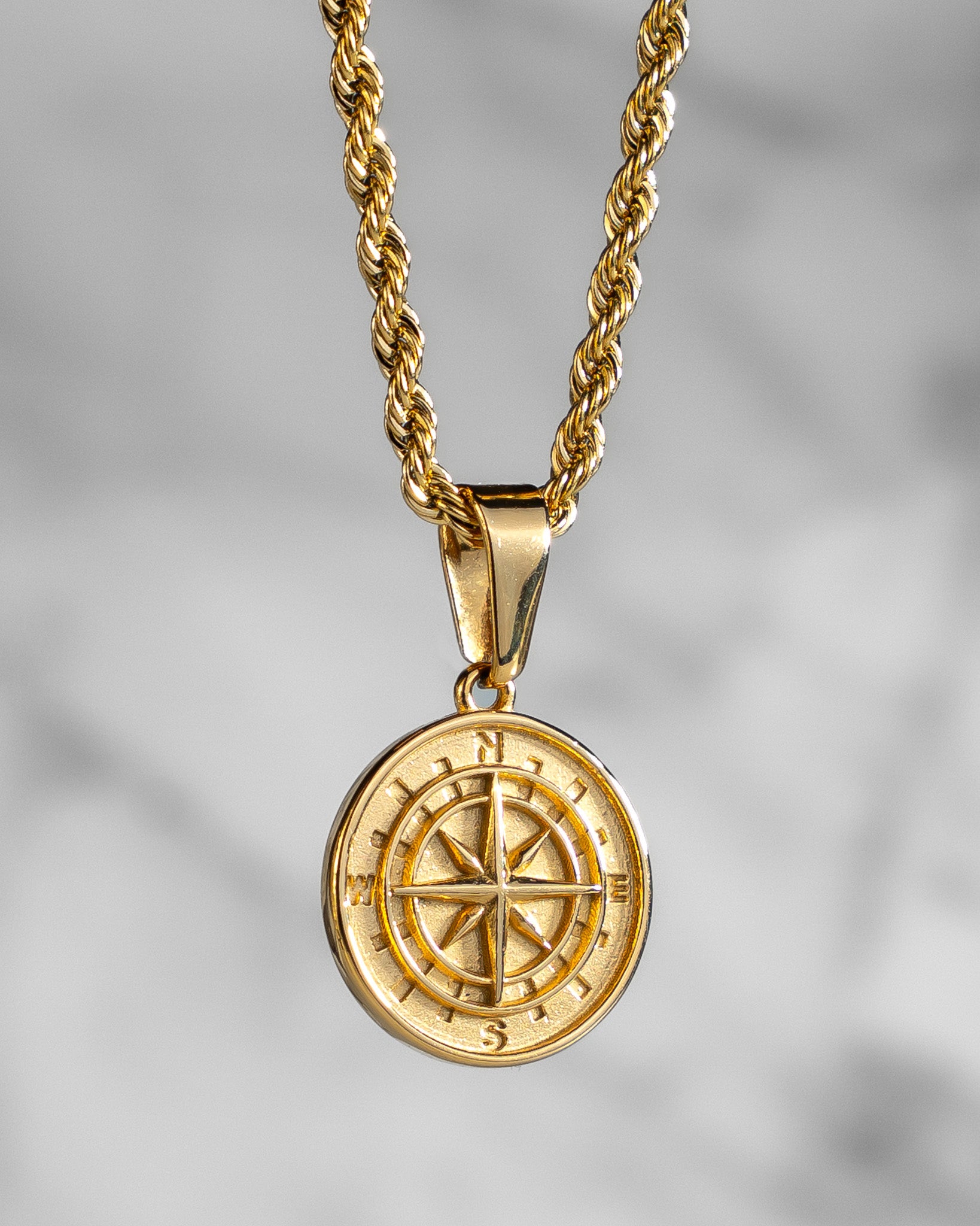 Gold compass